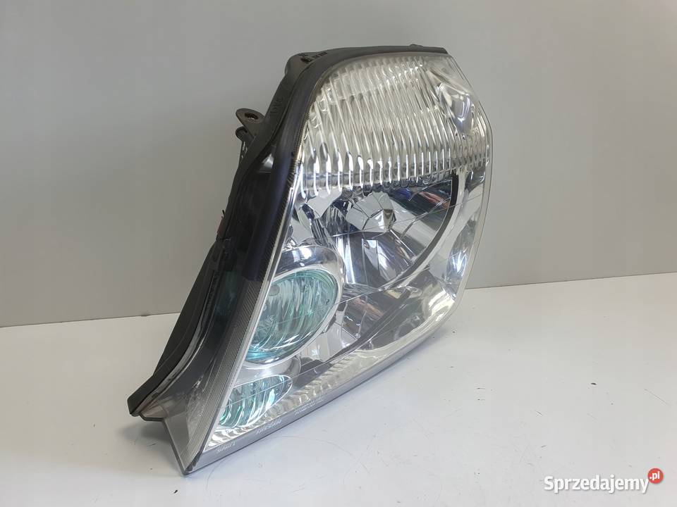 LAMPA LEWA Nissan XTrail I T30 0007r PRZEDNIA Oświetlenie Rudka
