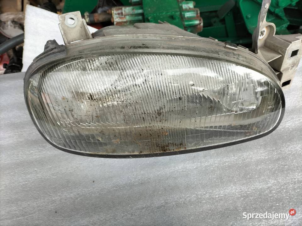 Mazda 121 LAMPA PRZÓD PRZEDNIA PRZWA Oświetlenie Kamień-Kolonia