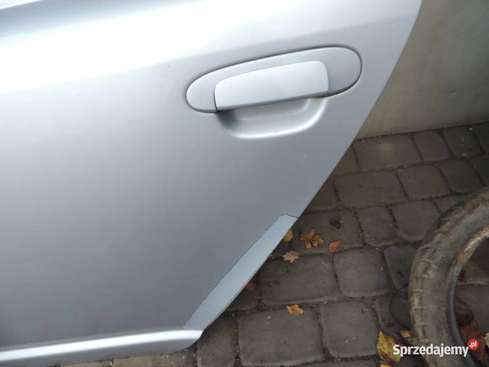 DRZWI LEWY TYŁ TOYOTA YARIS 1 KOLOR 199 Nowy Sącz