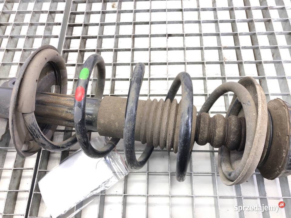 AMORTYZATOR LEWY PRZÓD ZE SPRĘŻYNĄ DACIA DUSTER