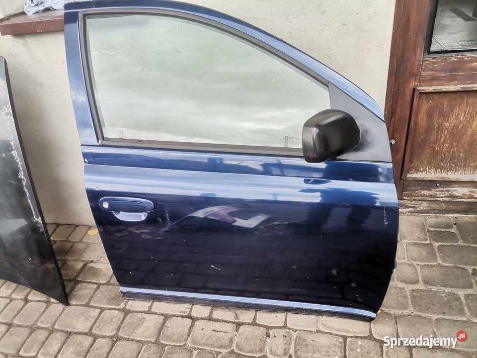 DRZWI PRAWY PRZÓD TOYOTA YARIS 1 8K8 Nowy Sącz