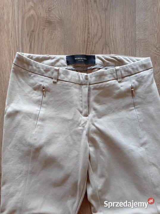 Beżowe spodnie Reserved brązowy/beżowy Hajnówka