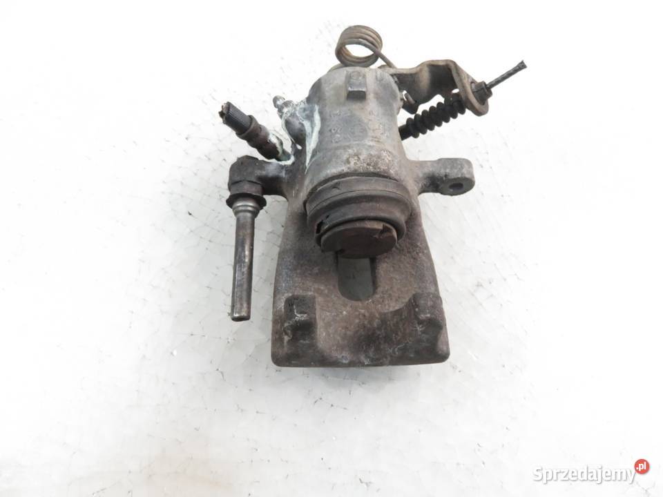 ZACISK PRAWY TYŁ OPEL ZAFIRA A osobowe Zaciski i jarzma małopolskie