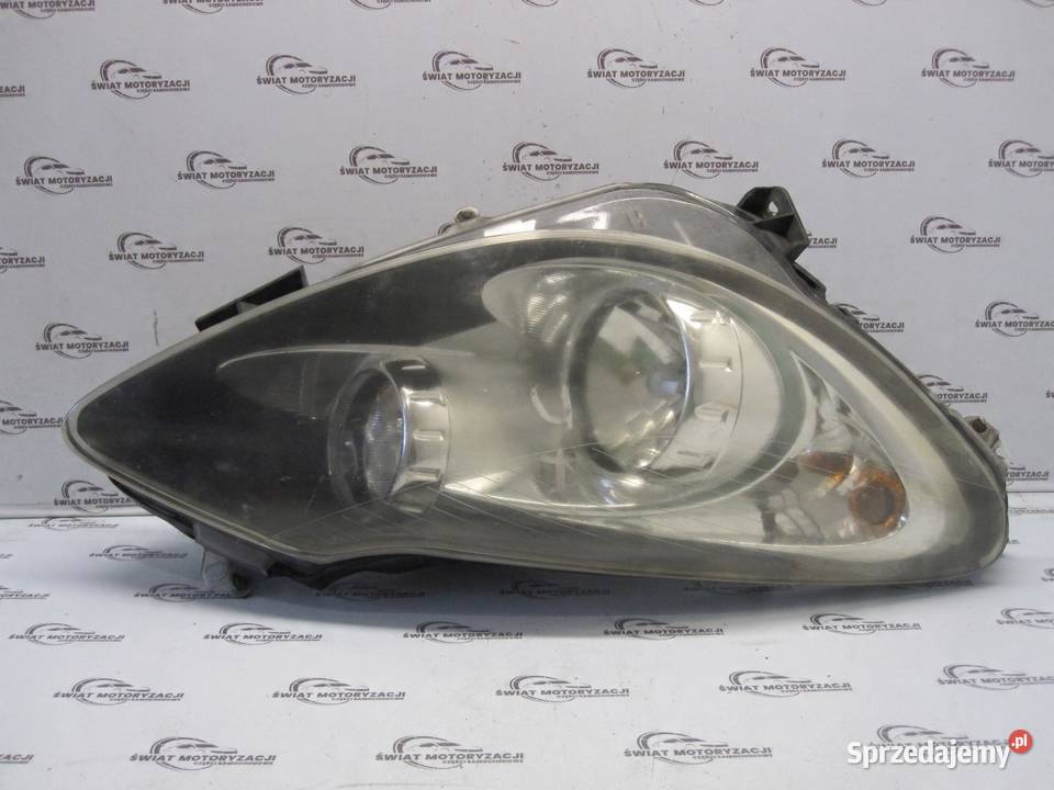 OPEL CORSA D lampa prawa przód 89391390 13217456