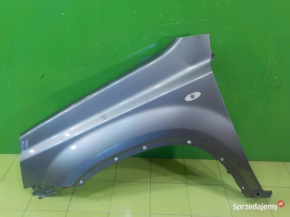 NISSAN XTRAIL II T31 0713r 5D blotnik lewy przod Części samochodowe Suków