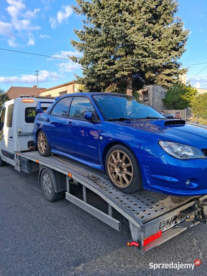 Pomoc drogowa LgińAutolaweta 6 pasażerów Laweta