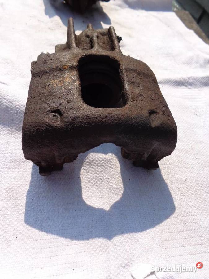 ZACISK PRZÓD lewy FORD FOCUS I MK1 9804 18 TDCI osobowe Skwierzyna