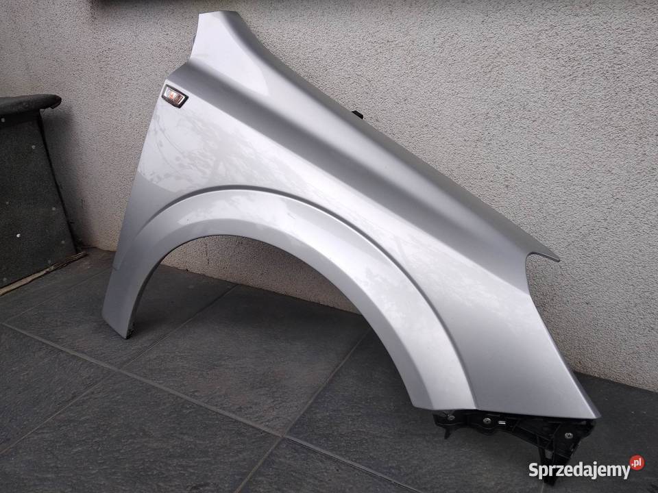 Opel Astra H błotnik przedni prawy srebrny Z157 Sieradz