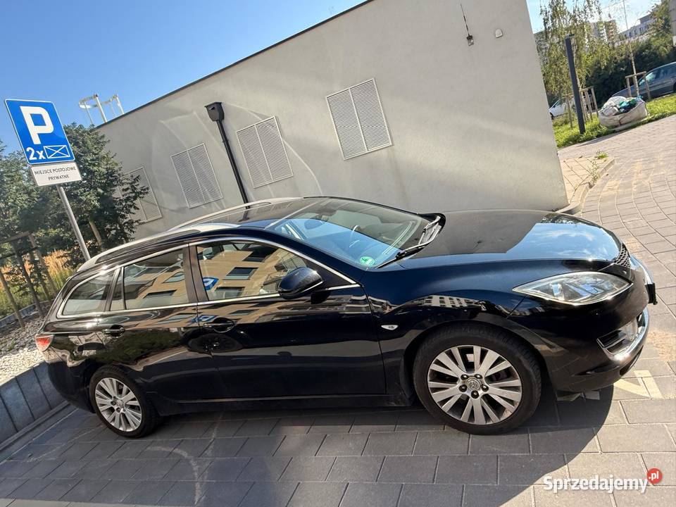 Mazda 6 20 benzyna 2009 132 265 Czarna 25 000