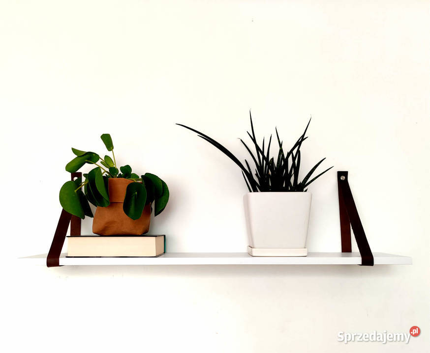 półka na ksiązki biała na paskach skórzanych
