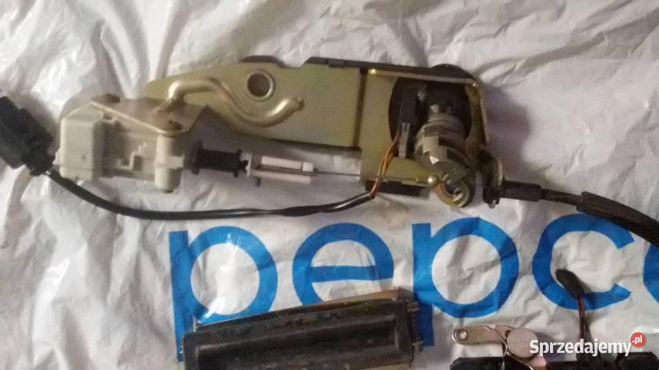 KLAMKA TYLNEGO BAGAZNIKA VW PASSAT B5 FL KOMBI