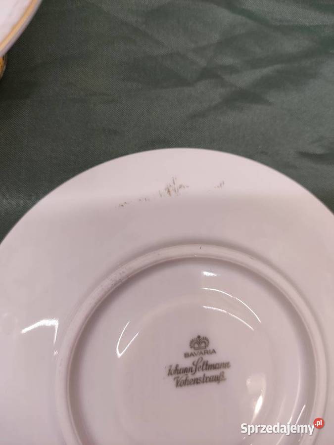Filiżanka ze spodkiem i talerzykiem porcelana