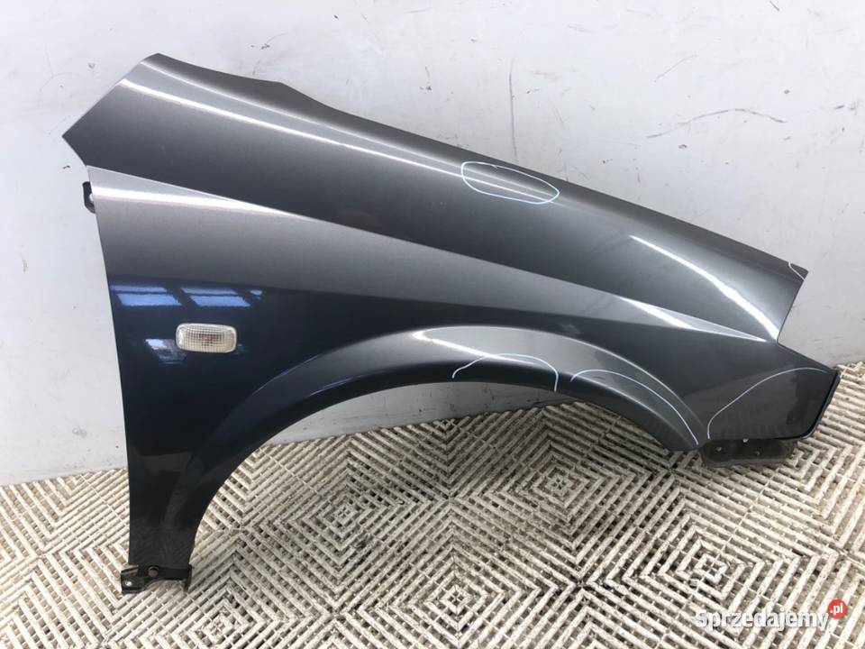 BŁOTNIK PRAWY PRZÓD NISSAN PRIMERA P12 Hatchback