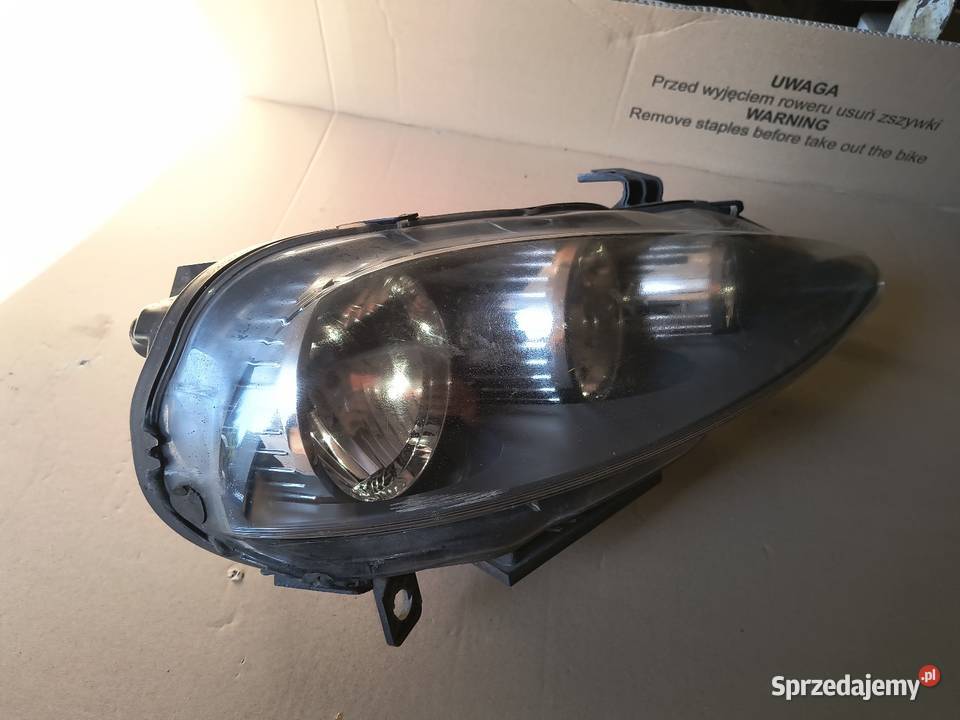 Alfa Romeo 147 lift Reflektor prawy kpl Oryginał osobowe Domasław