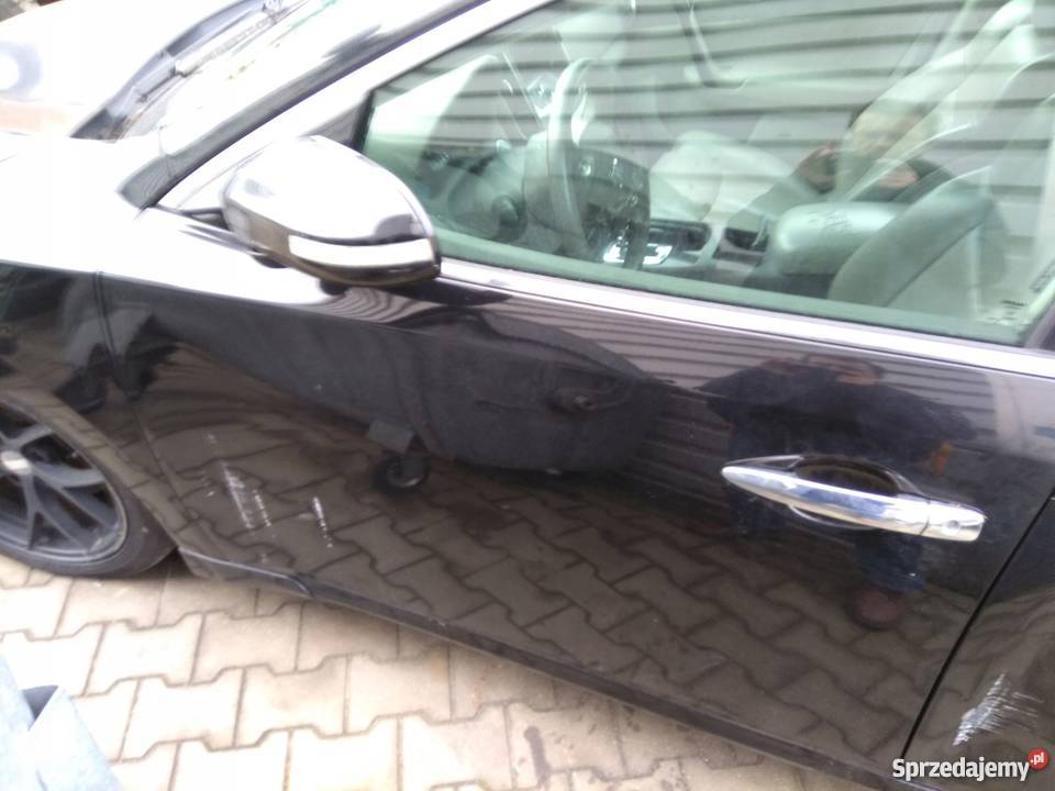 KLAMKA DRZWI PRZEDNIA PRAWA LEWA NISSAN MAXIMA Karoseria Nowy Tomyśl