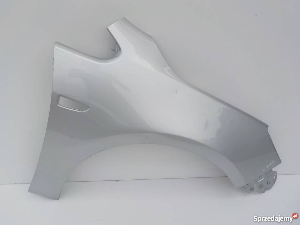 BŁOTNIK PRAWY PRZÓD OPEL ASTRA 4 IV Motoryzacja