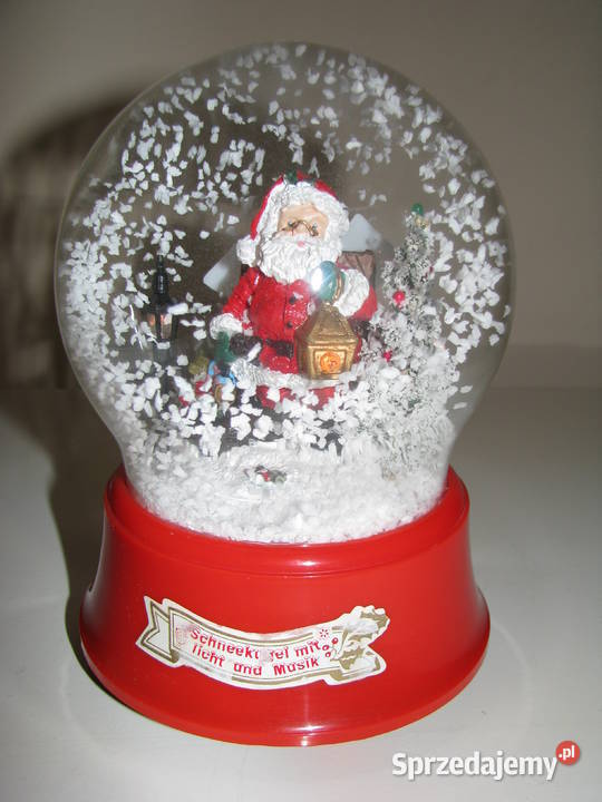 Duża obracająca się i świecąca kula śnieżna z Boże Narodzenie Brzegi