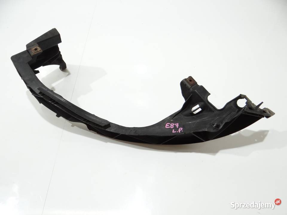 ŚLIZG MOCOWANIE LAMPY LEWY PRZÓD BMW E87 7120823