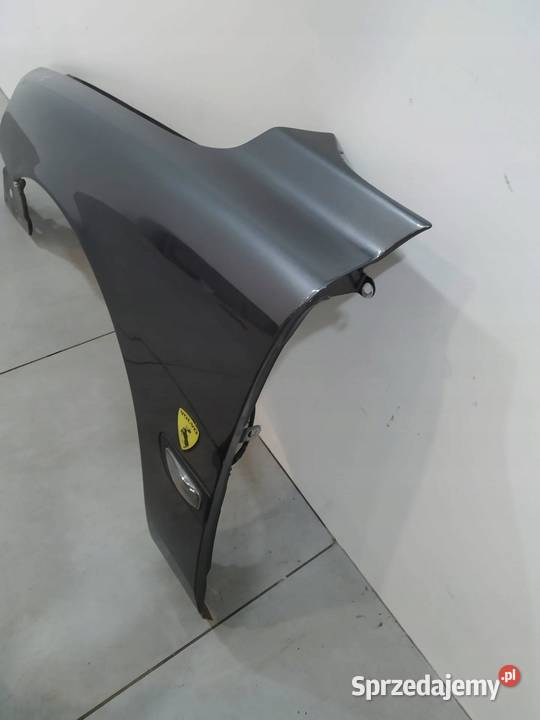 BŁOTNIK LEWY PRZÓD SZARY 03R Volvo S60 I Błotniki Motoryzacja