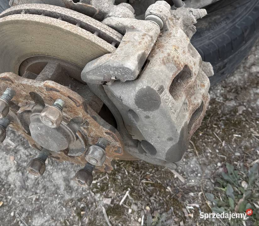 Zacisk hamulcowy lewy Mazda E2200 Ostrów Wielkopolski