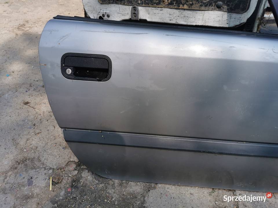 drzwi przód prawe opel Calibra 1995r zamek części blacharskie Międzychód