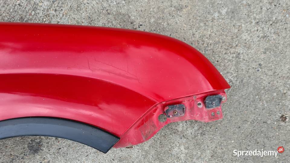 Suzuki Ignis MH 0410 błotnik przód przedni Legnica