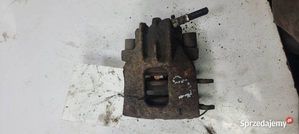 ZACISK HAMULCOWY PRZÓD LEWY FORD FOCUS MK1 Lipno