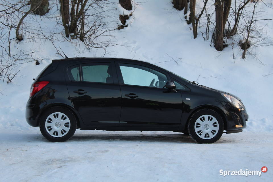 Opel Corsa D 14 87 2014r przyciemniane szyby Corsa Blizne