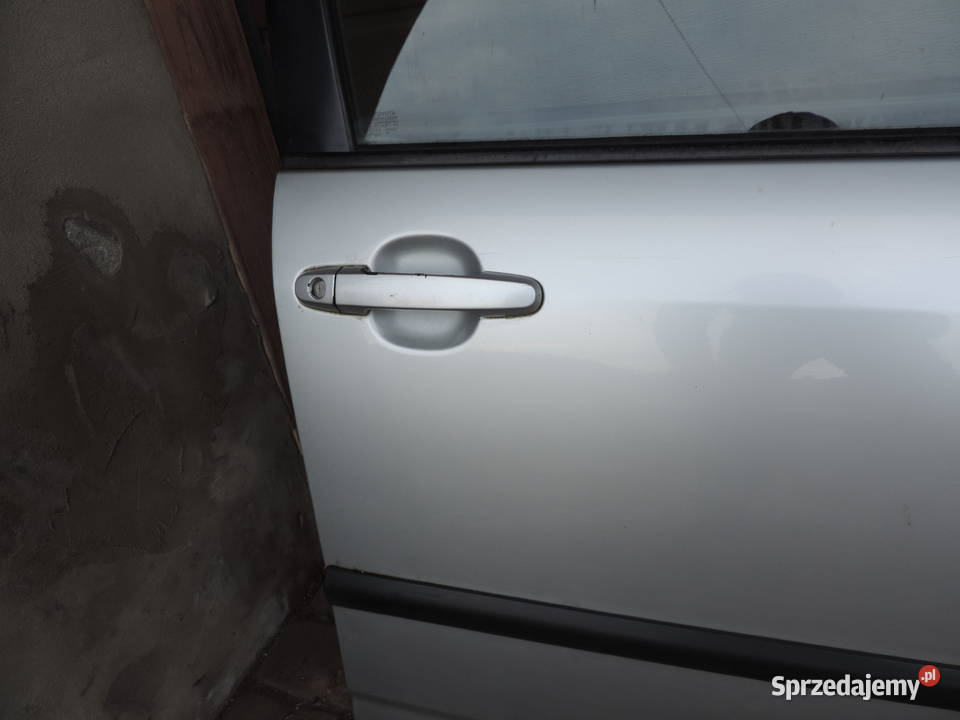 TOYOTA COROLLA E12 SEDAN DRZWI PRAWY PRZÓD 199 Rok produkcji 2003 Nowy Sącz