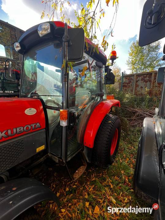 Traktor Kubota L5240HST Kubota m7040 MANUAL Daltrozów