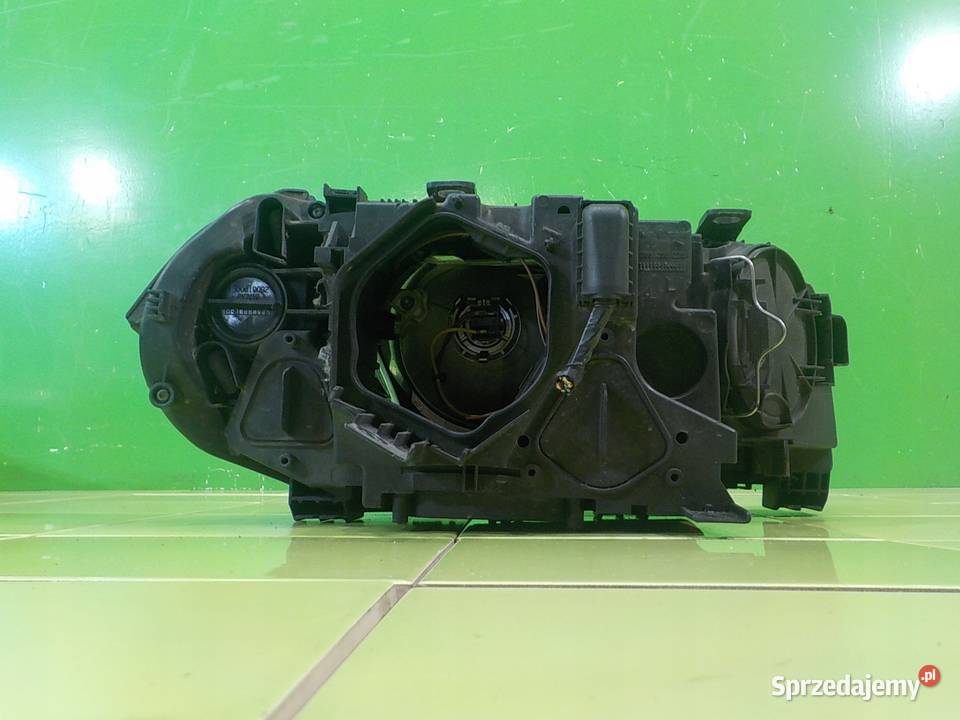 BMW X3 E83 20 D LIFT 07r 5D lampa lewa przod Suków