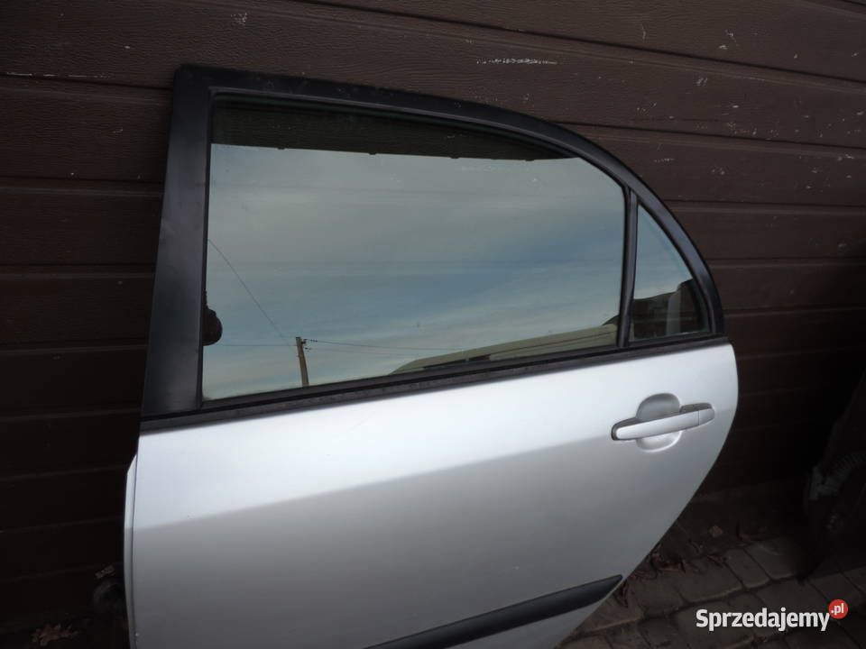 TOYOTA COROLLA E12 SEDAN DRZWI LEWY TYŁ 199 Rok produkcji 2003 Drzwi małopolskie