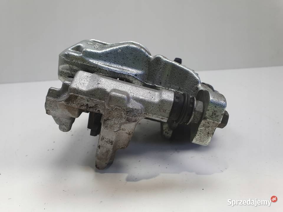 Toyota Yaris IV TYLNY ZACISK HAMULCOWY prawy tył Rudka