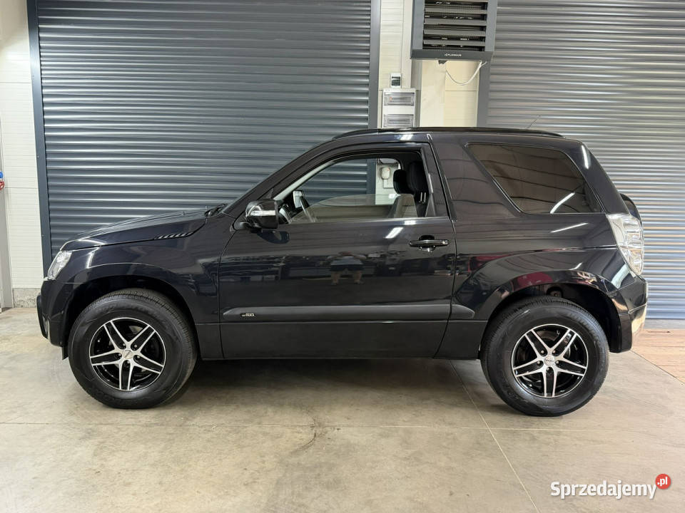 Suzuki Grand Vitara 24 AUTOMAT salon perfekcyjna nieuszkodzony Grand Vitara Suzuki Chechło