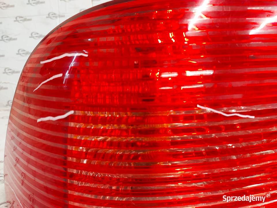 CAYENNE I 7L5 12r lampa lewa tył 7L5945095A osobowe