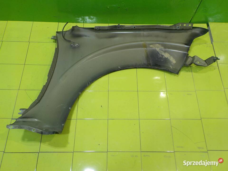 NISSAN NAVARA III D40 25 D 06r 5D blotnik lewy Suków