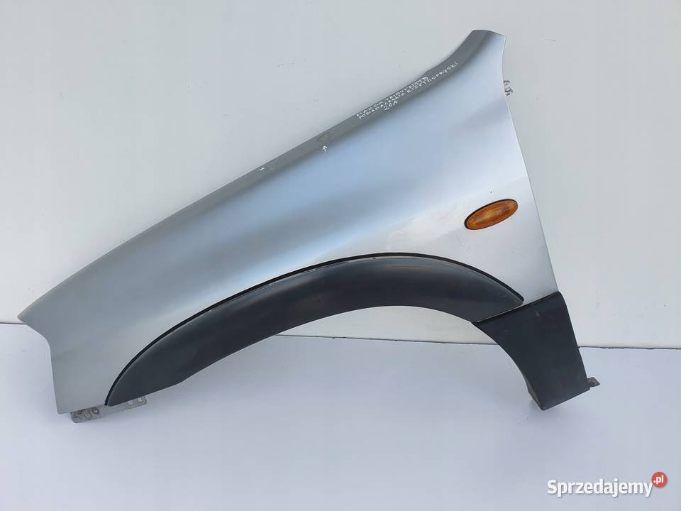 Mazda Tribute PRZEDNI BŁOTNIK LEWY PRZÓD 26A Rudka