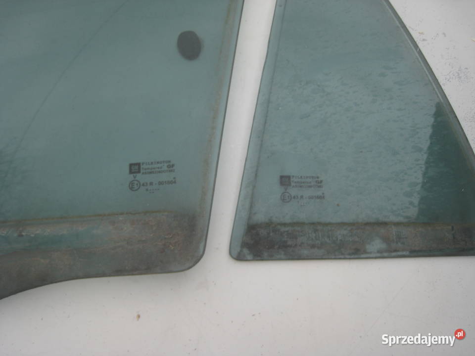 Szyba boczna drzwi tylnych tył Opel Astra H osobowe Boczne (drzwi) Kraków