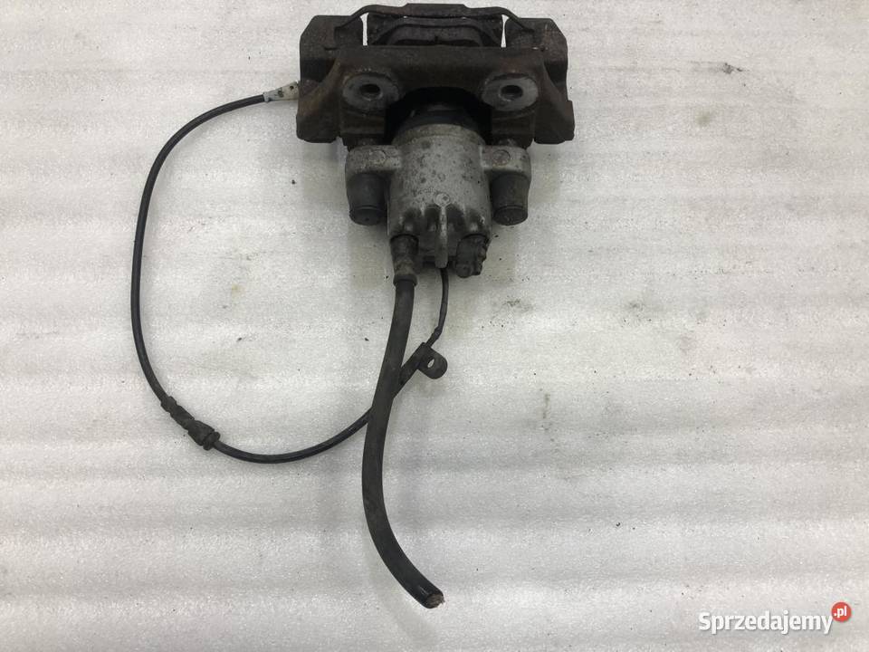 ZACISK HAMULCOWY PRAWY TYŁ BMW E60