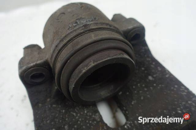 BMW F10 F11 20 D PRZEDNI ZACISK HAMULCOWY lewy