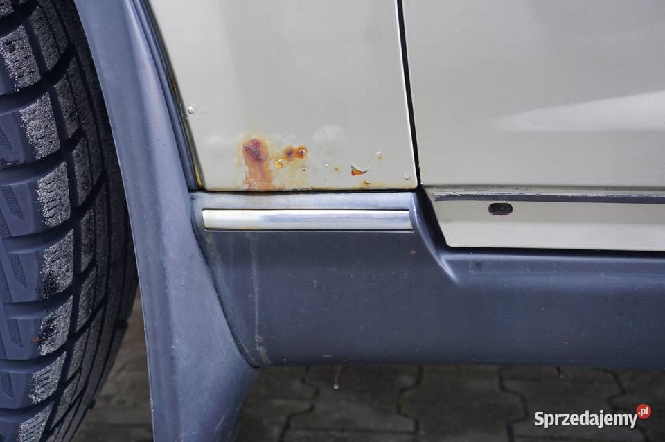 BŁOTNIK LEWY PRZÓD INFINITI FX35 FX45 Części samochodowe Nowy Tomyśl