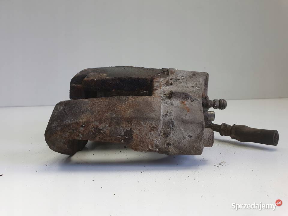 Volvo XC90 I PRZEDNI ZACISK HAMULCOWY lewy przód Chełm