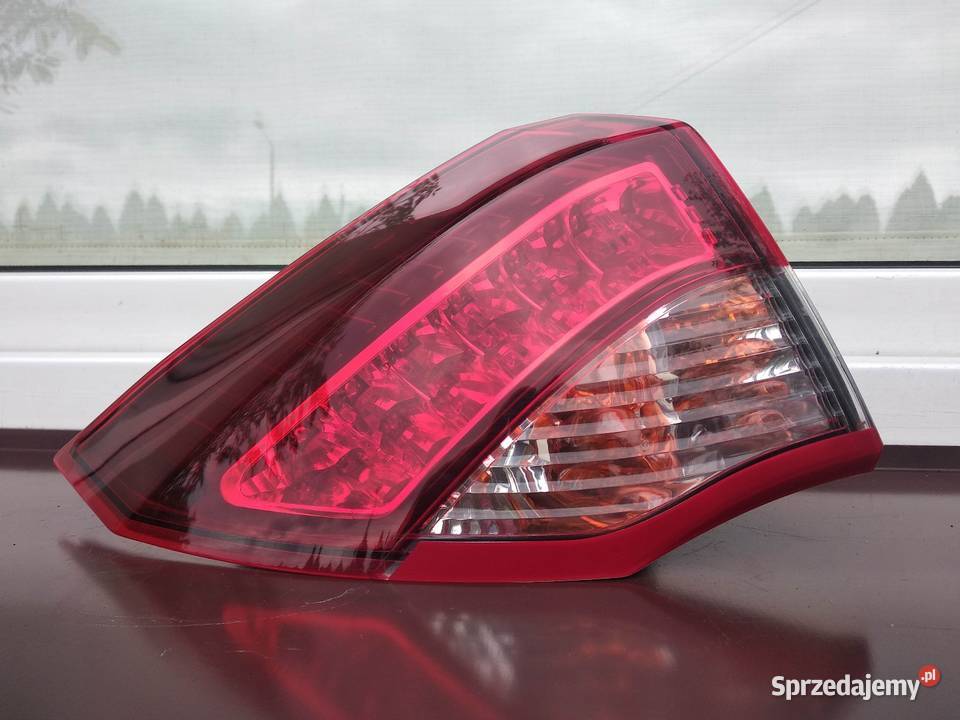 Renault Laguna 3 III liftback lampa tył tylna Sieradz