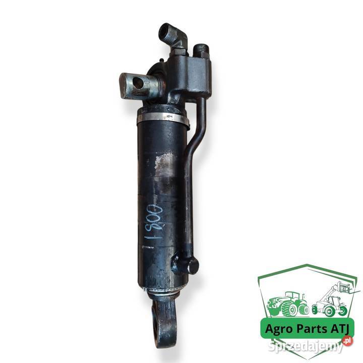 Siłownik amortyzacji przedniej osi CNH 87696280 Ciechanowiec