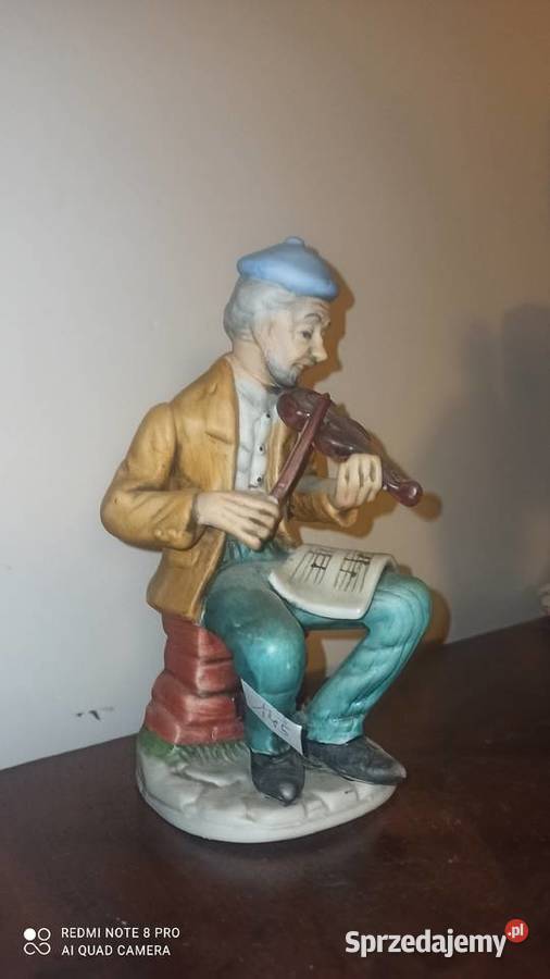 Figurka grajka z nutami na kolanach Skrzypek Porcelana i szkło Gdańsk