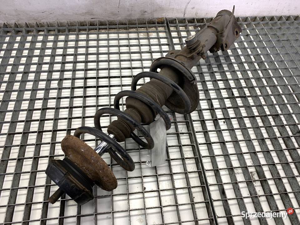 AMORTYZATOR PRAWY PRZÓD ZE SPRĘŻYNĄ DACIA DUSTER osobowe