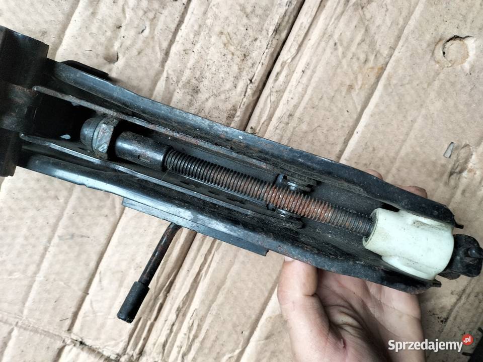 FORD MONDEO MK1 MK2 ORYGINALNY PODNOŚNIK LEWAREK