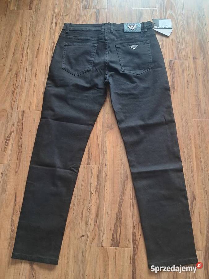 nowe czarne spodnie jensowe na wyższego Sandomierz