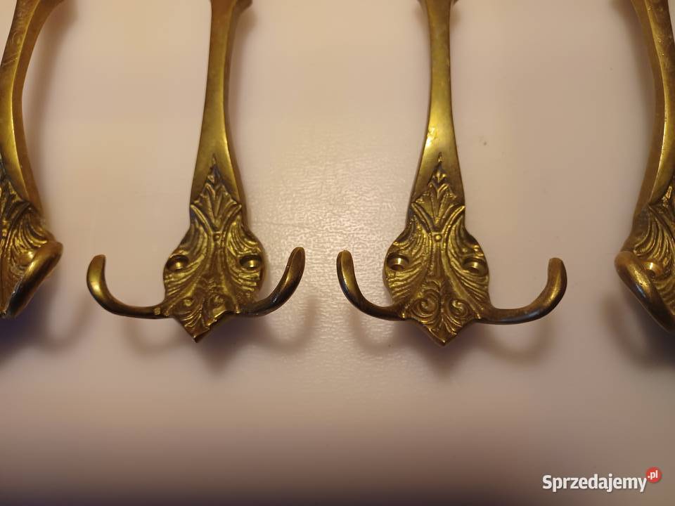 Komplet czterech dużych wieszaków Mosiądz Wyposażenie wnętrz Poznań sprzedam