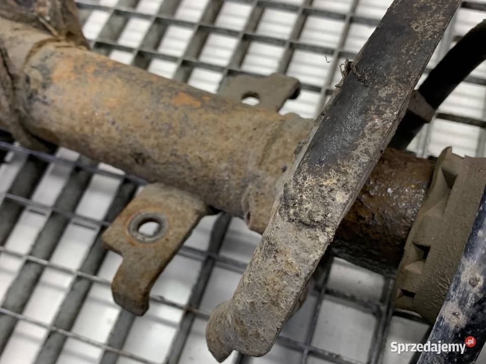 AMORTYZATOR LEWY PRZÓD ZE SPRĘŻYNĄ RENAULT